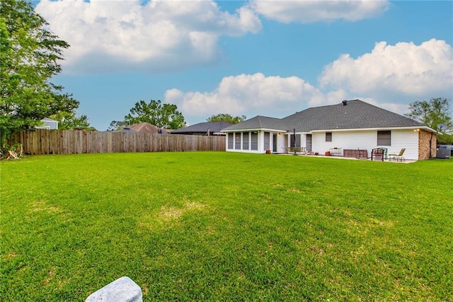 706 Natalie Dr, Houma, LA 70364 - view of yard with a fenced backyard and a patio area