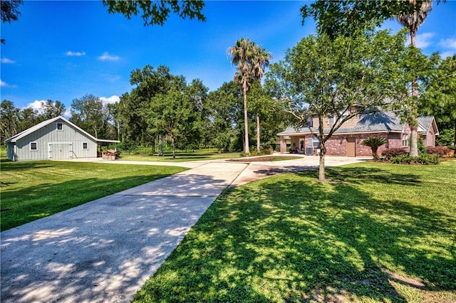 surrounding community featuring driveway and a yard