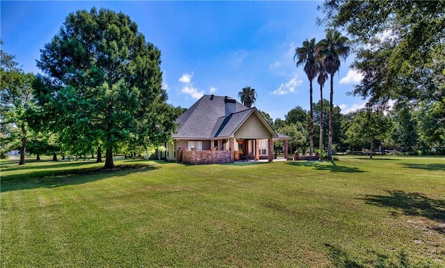 exterior space featuring a lawn