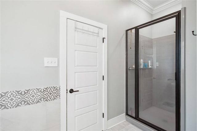 441 Hancock St, Gretna, LA 70053 - bathroom featuring ornamental molding, a stall shower, and baseboards