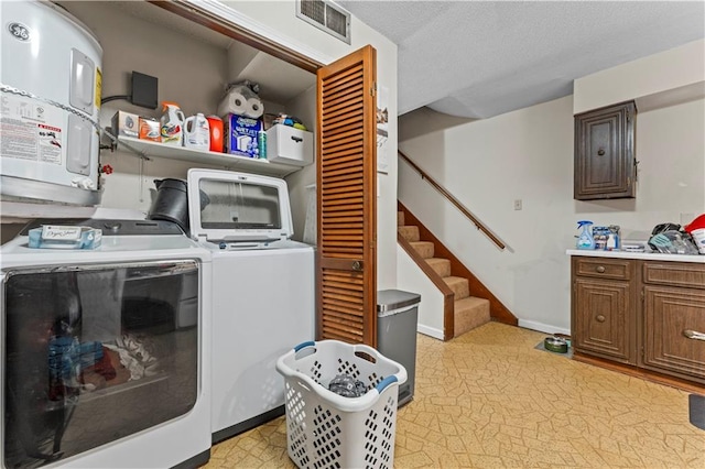 2900 Harvard Ave, Metairie, LA 70006 - laundry area with separate washer and dryer and water heater
