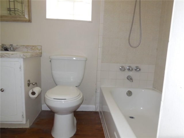 2900 Harvard Ave, Metairie, LA 70006 - full bathroom featuring vanity, wood finished floors, and shower / tub combination