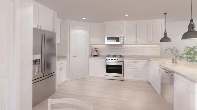 4412 Park Shore Dr, Marrero, LA 70072 - kitchen with white cabinets, tasteful backsplash, decorative light fixtures, and appliances with stainless steel finishes