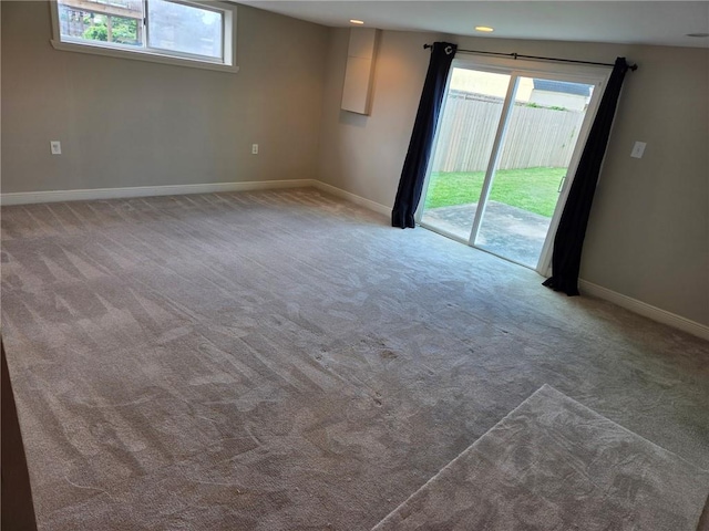 305 Amapola Cir, Terrytown, LA 70056 - spare room featuring baseboards, carpet floors, and plenty of natural light