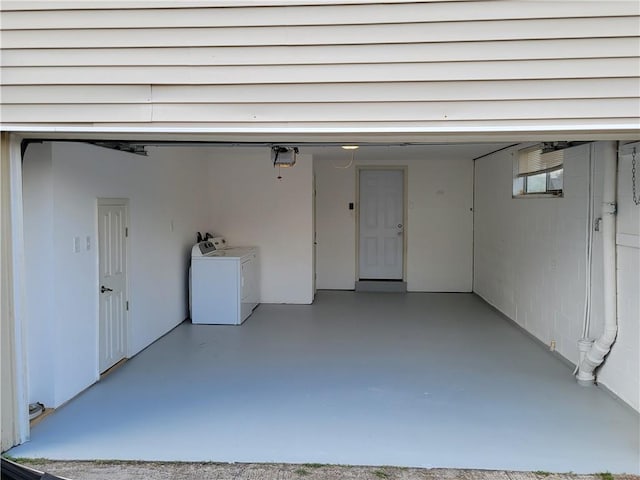 garage featuring washer and clothes dryer