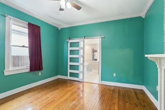 4674 Venus St, New Orleans, LA 70122 - unfurnished room featuring crown molding, wood finished floors, and ceiling fan