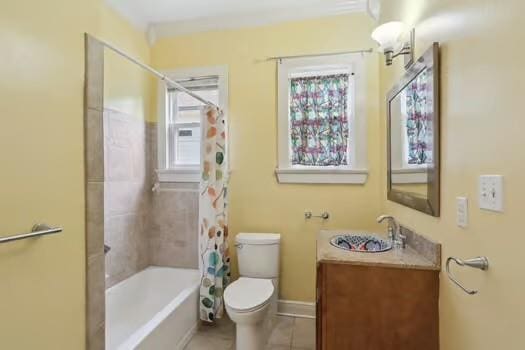 4674 Venus St, New Orleans, LA 70122 - full bath featuring vanity, shower / bath combination with curtain, and tile patterned floors