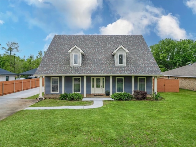 212 Somerset St, La Place, LA 70068 - cape cod house featuring covered porch and roof with shingles