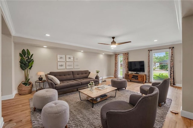 212 Somerset St, La Place, LA 70068 - living area with light wood-style flooring, ornamental molding, ceiling fan, baseboards, and recessed lighting