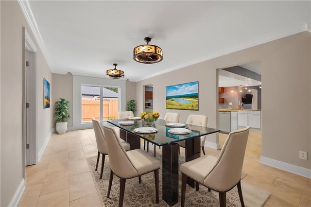 212 Somerset St, La Place, LA 70068 - dining room featuring ornamental molding and light tile patterned floors
