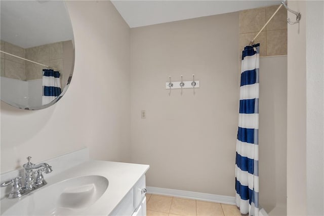 full bath featuring tile patterned floors, vanity, a shower with shower curtain, and baseboards