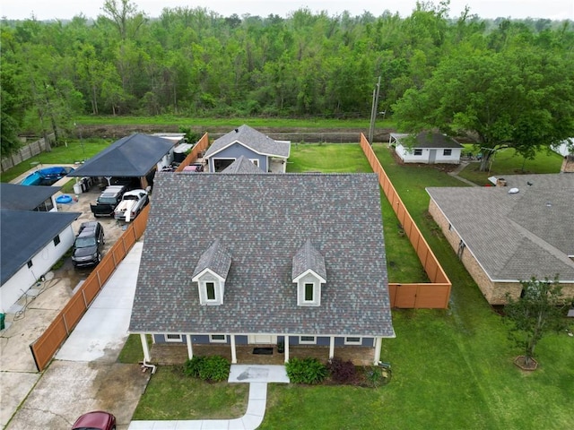 drone / aerial view with a view of trees