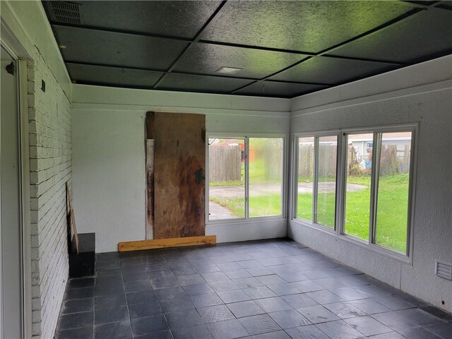 2745 Phil Ln, Marrero, LA 70072 - unfurnished sunroom with tile patterned flooring