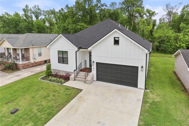185 Boutte Estates Dr, Boutte, LA 70039 - modern farmhouse with driveway, an attached garage, board and batten siding, and a front yard