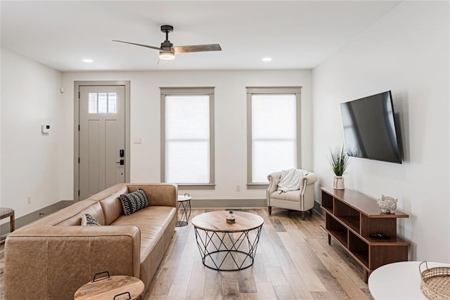 41820 S Genois St, New Orleans, LA 70119 - living room featuring light wood-style flooring, a ceiling fan, recessed lighting, and baseboards