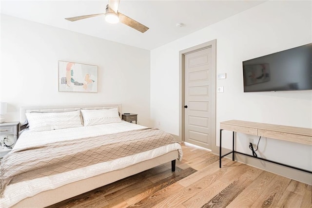 41820 S Genois St, New Orleans, LA 70119 - bedroom featuring ceiling fan and wood finished floors