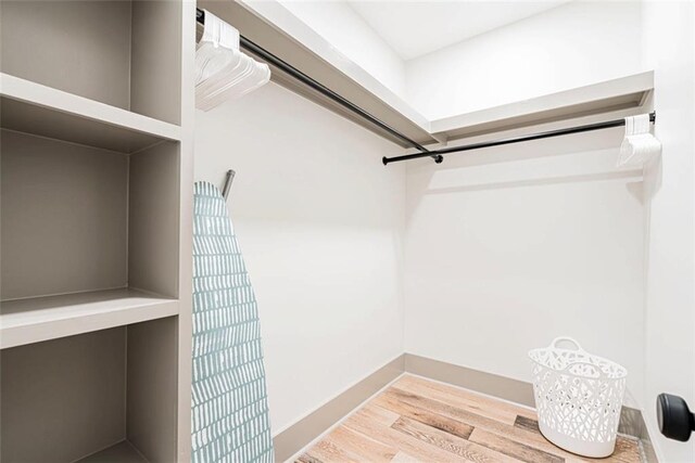 41820 S Genois St, New Orleans, LA 70119 - walk in closet featuring wood finished floors