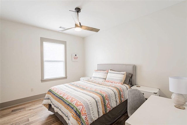 41820 S Genois St, New Orleans, LA 70119 - bedroom featuring visible vents, ceiling fan, wood finished floors, and baseboards