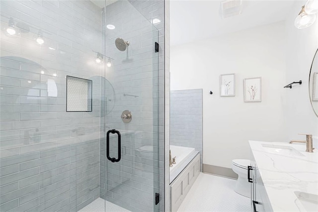 41820 S Genois St, New Orleans, LA 70119 - full bathroom with a shower stall, tile patterned floors, vanity, and toilet