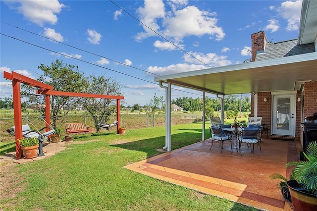 view of yard with a patio and fence