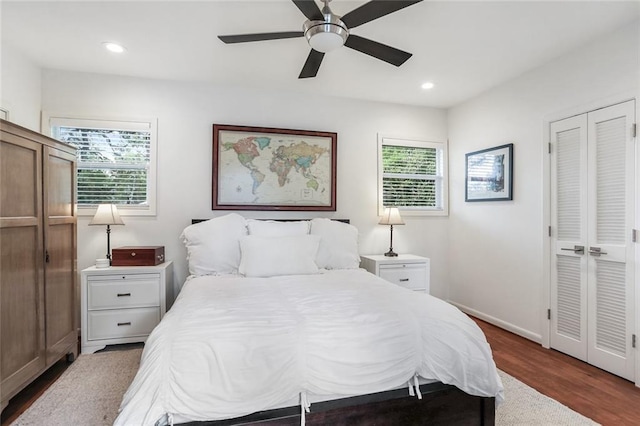 bedroom featuring recessed lighting, baseboards, a ceiling fan, and dark wood-style flooring