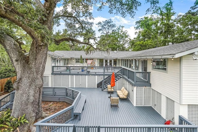 wooden deck featuring stairway