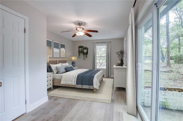 21216 Gardenia St, Covington, LA 70435 - bedroom with wood finished floors and ceiling fan
