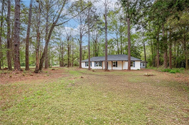 21216 Gardenia St, Covington, LA 70435 - view of front facade featuring a front yard