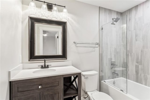 bathroom with shower / tub combination, vanity, and toilet