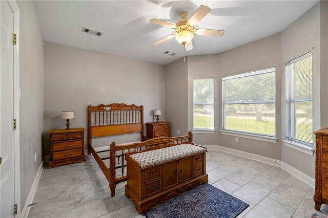 41226 Rene Dr, Hammond, LA 70403 - bedroom featuring multiple windows, a ceiling fan, and light tile patterned flooring