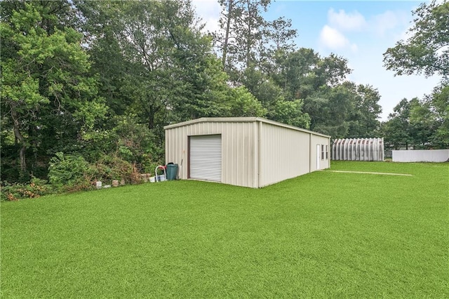 41226 Rene Dr, Hammond, LA 70403 - view of yard with an outbuilding, a detached garage, and view of scattered trees
