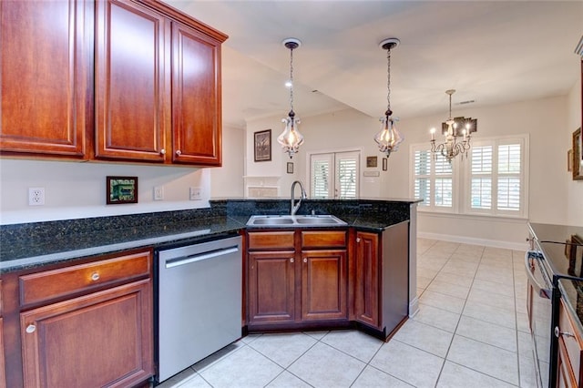 111 Cornerstone Dr Unit 1A, Slidell, LA 70461 - kitchen with stainless steel appliances, a peninsula, light tile patterned flooring, a chandelier, and decorative light fixtures