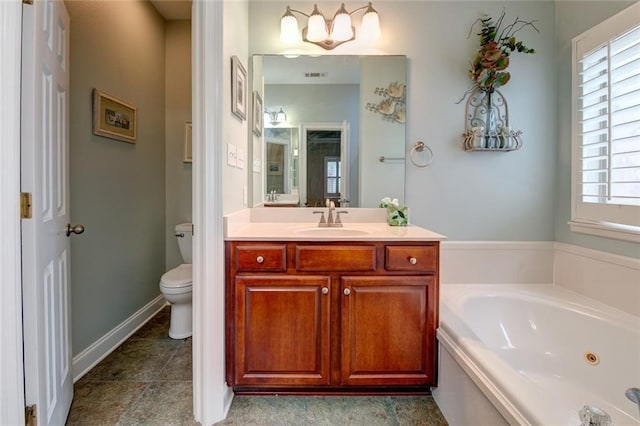 111 Cornerstone Dr Unit 1A, Slidell, LA 70461 - bathroom featuring a whirlpool tub and vanity