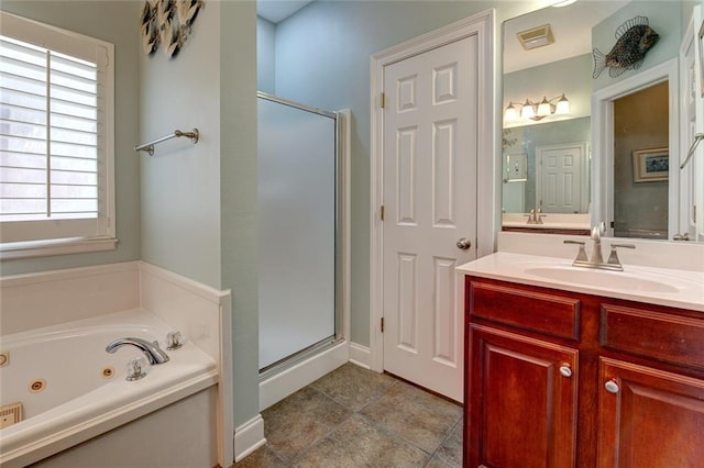 111 Cornerstone Dr Unit 1A, Slidell, LA 70461 - full bathroom featuring a shower stall, a whirlpool tub, vanity, and tile patterned flooring