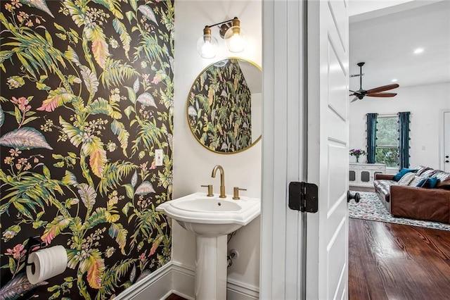 8501 Cohn St, New Orleans, LA 70118 - bathroom with a sink, ceiling fan, and wood finished floors