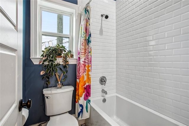 8501 Cohn St, New Orleans, LA 70118 - bathroom with toilet and shower / bathtub combination with curtain