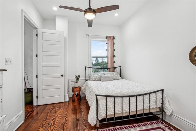 8501 Cohn St, New Orleans, LA 70118 - bedroom with baseboards, wood finished floors, ceiling fan, and recessed lighting