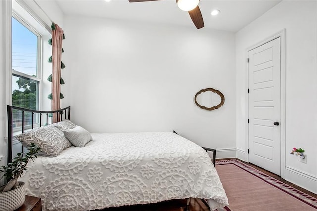 8501 Cohn St, New Orleans, LA 70118 - bedroom featuring baseboards, ceiling fan, wood finished floors, and recessed lighting