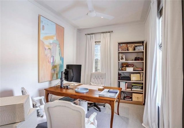 home office featuring carpet floors and ceiling fan