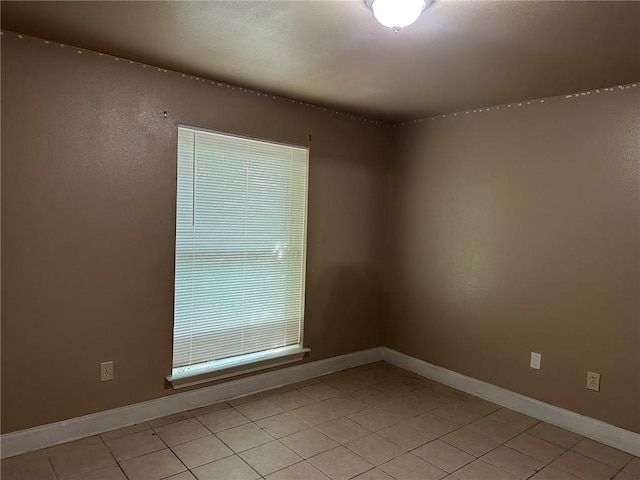 44154 Simpson Pl, Hammond, LA 70403 - unfurnished room featuring baseboards and light tile patterned floors