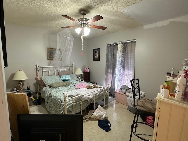 44176 Simpson Pl, Hammond, LA 70403 - bedroom featuring a ceiling fan and a textured ceiling