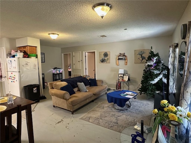 44301 Simpson Pl, Hammond, LA 70403 - living room featuring visible vents, concrete floors, and a textured ceiling