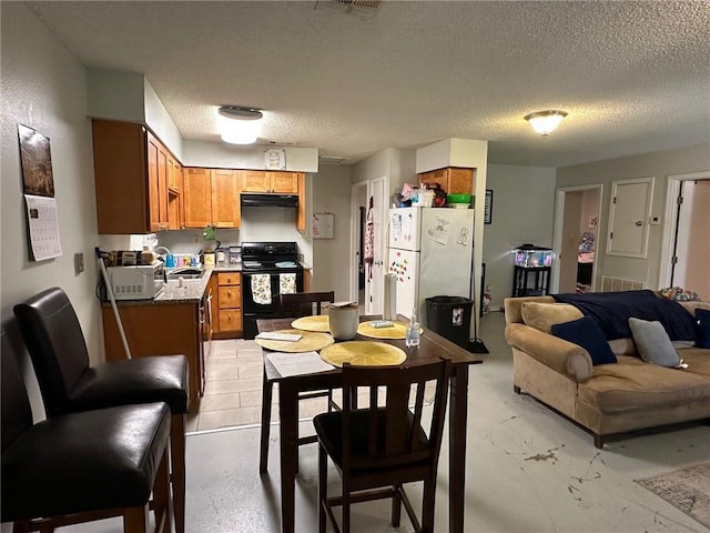 44301 Simpson Pl, Hammond, LA 70403 - kitchen with a textured ceiling, brown cabinets, open floor plan, white appliances, and exhaust hood