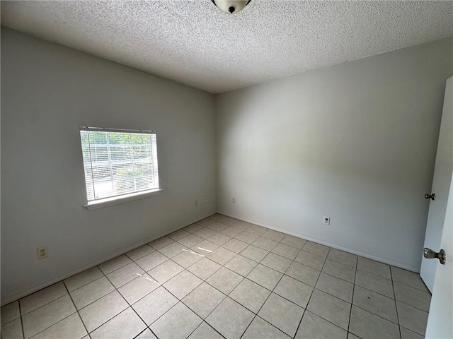 44321 Simpson Pl, Hammond, LA 70403 - spare room with a textured ceiling and light tile patterned floors