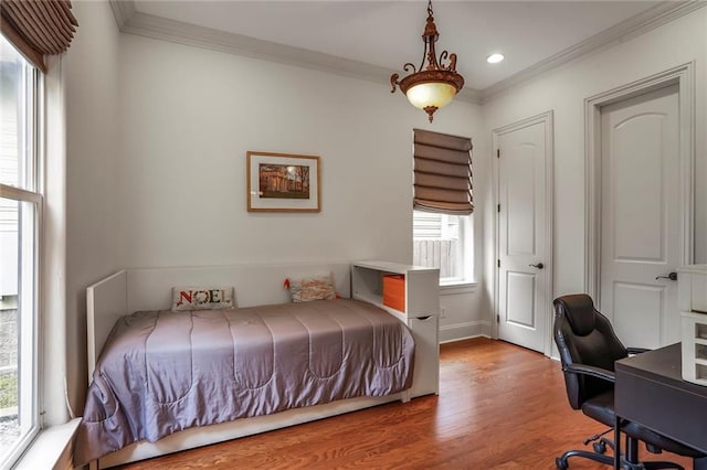 6021 W End Blvd, New Orleans, LA 70124 - bedroom featuring ornamental molding, wood finished floors, recessed lighting, and an office area