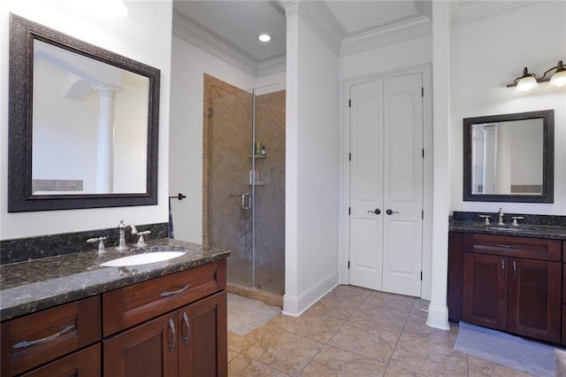 6021 W End Blvd, New Orleans, LA 70124 - full bath with a shower stall, decorative columns, two vanities, ornamental molding, and recessed lighting