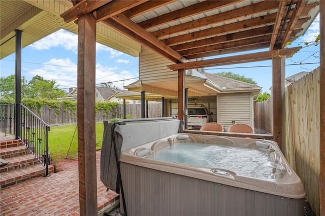 6021 W End Blvd, New Orleans, LA 70124 - fenced backyard featuring a hot tub and a patio