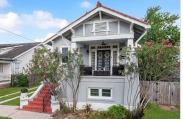 3015 Nashville Ave, New Orleans, LA 70125 - view of front of house with fence and covered porch