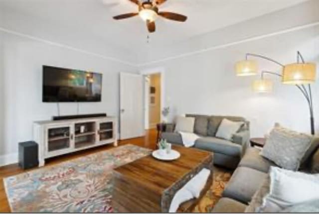 3015 Nashville Ave, New Orleans, LA 70125 - living area with wood finished floors and ceiling fan