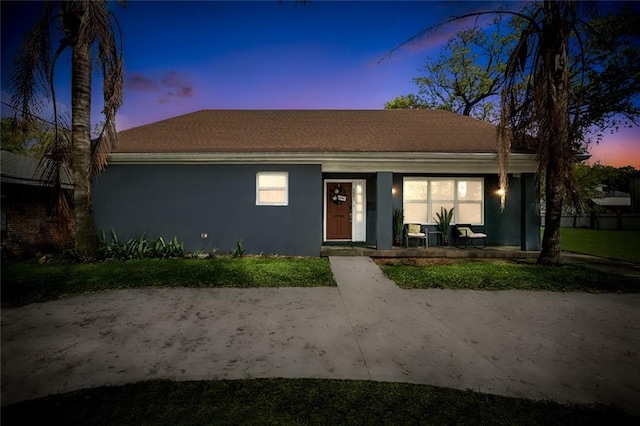 5601 Charlotte Dr, New Orleans, LA 70122 - ranch-style home featuring covered porch and stucco siding
